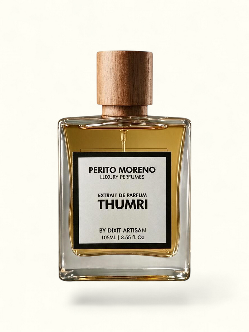 PERFUME BAY Thumri Eau De Parfum in a clear glass bottle with a wooden cap, featuring a minimalist white label.