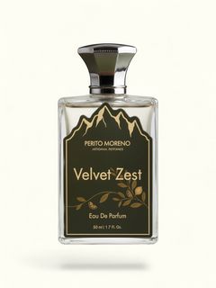 PERFUME BAY Velvet Zest eau de parfum in a clear glass bottle with a dark green mountain-themed label and silver cap.