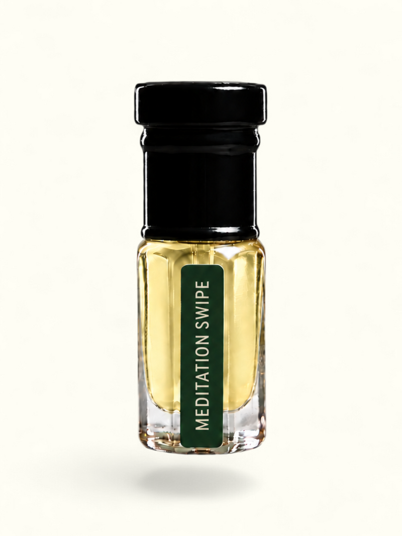A small clear glass bottle filled with pale yellow liquid, topped with a black cap, and featuring a dark green vertical label that reads 'MEDITATION SWIPE' in white text, centered on a plain white background.