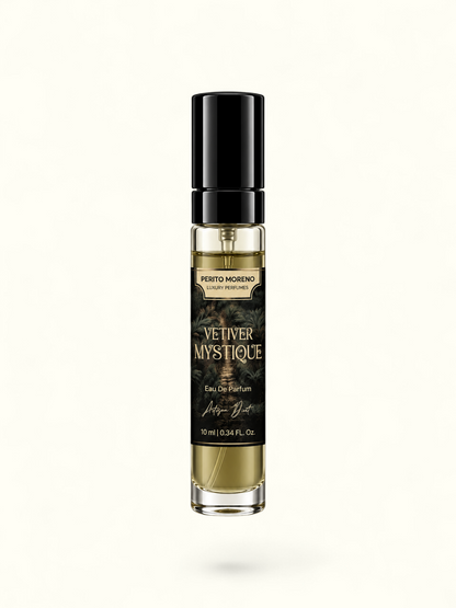 A 10ml perfume bottle of Vetiver Mystique by Perito Moreno, featuring a black cap, a black label with gold lettering, and golden-yellow liquid inside a clear glass bottle, set against a plain white background.