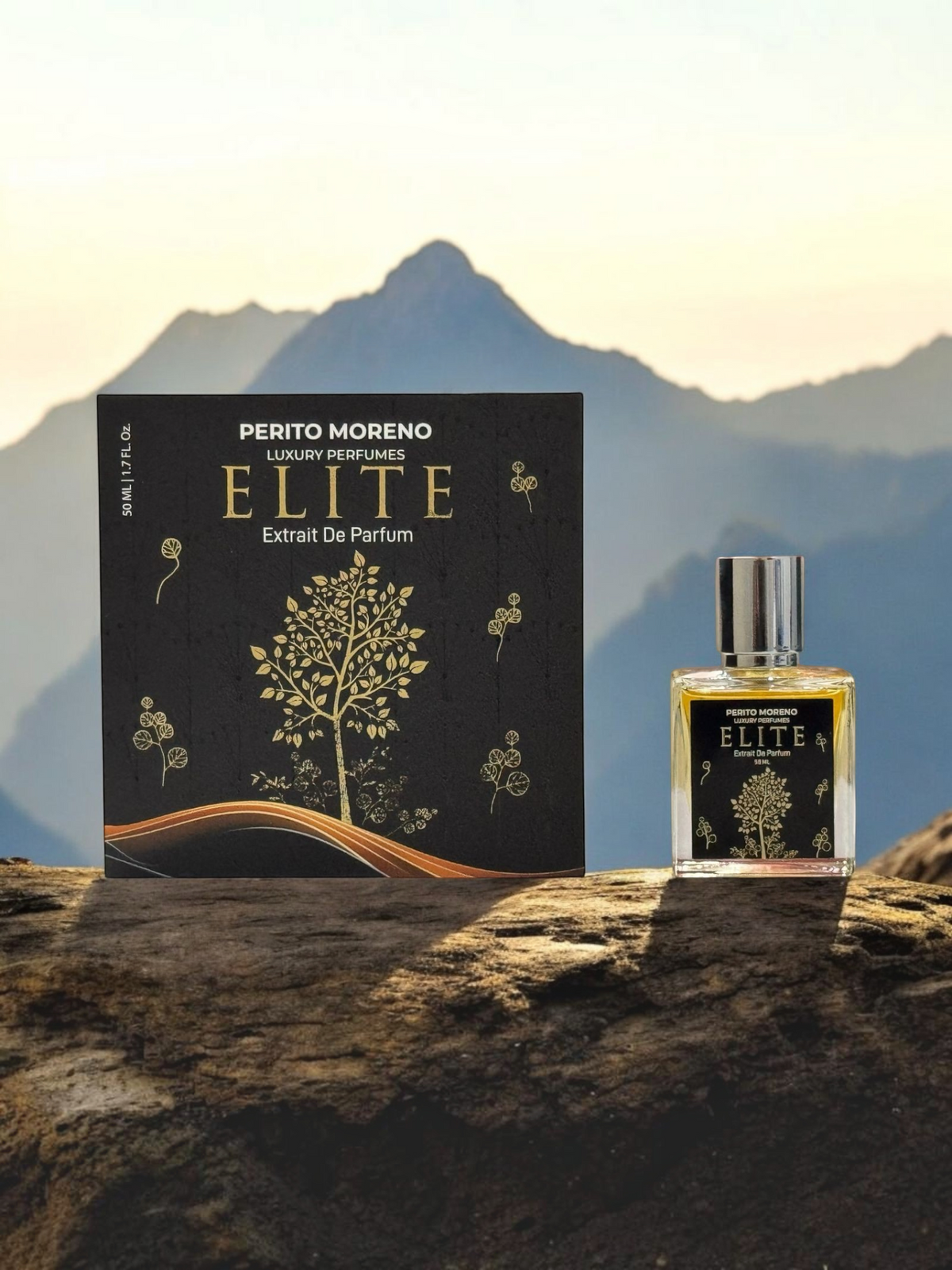 PERFUME BAY Elite Extrait De Parfum bottle and box set featuring gold tree design on a rocky mountain landscape