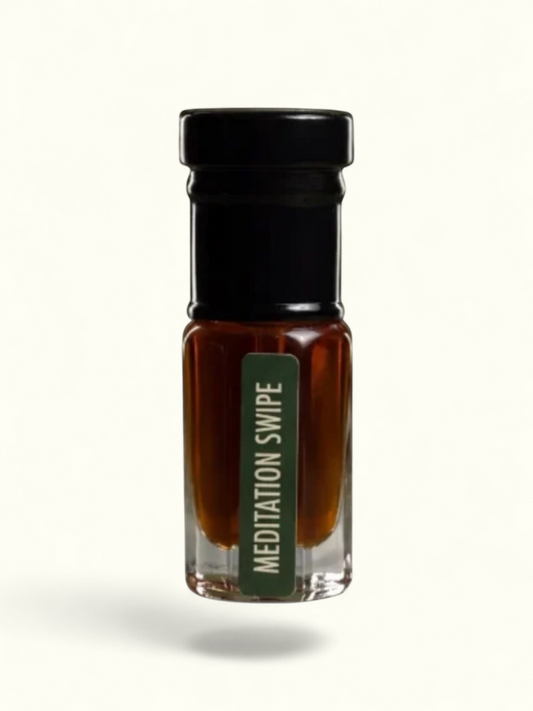 PERFUME BAY Meditation Swipe Next Chapter attar in a small glass bottle with a black cap and green label